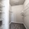 carpeted walk-in closet with lighting