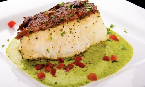 close-up of a gourmet fish meal on a plate